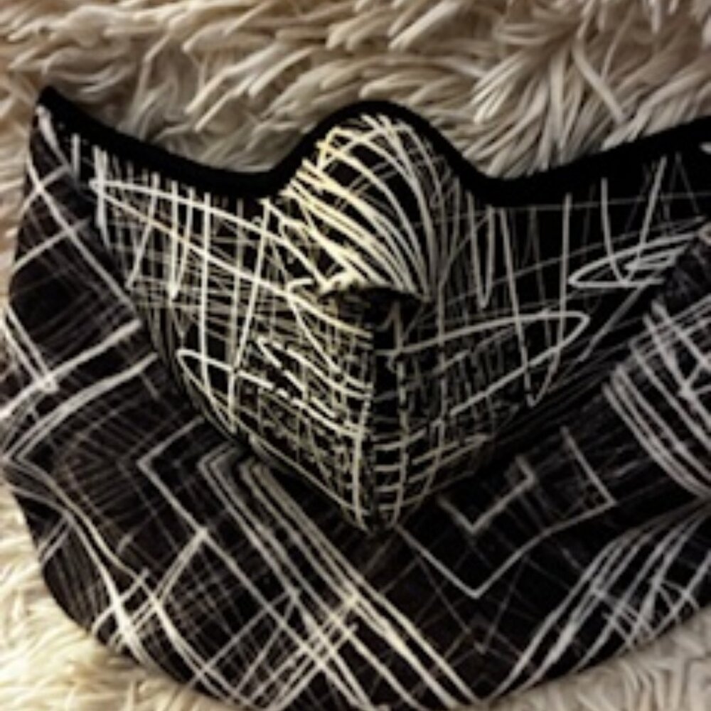 Black & white Face Mask for outdoor  protection while skiing or riding.